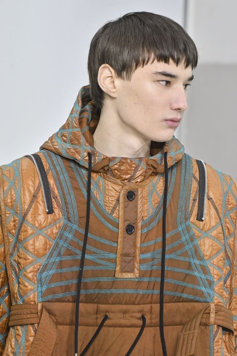 MALE MODEL WITH INTERESTING HAIRCUT