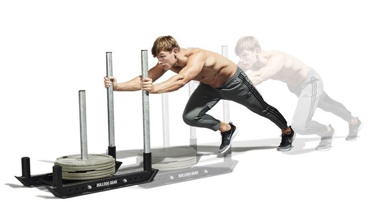 ATHLETE PERFORMING SLED PUSH